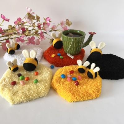 Honeycomb tufted coaster with bee