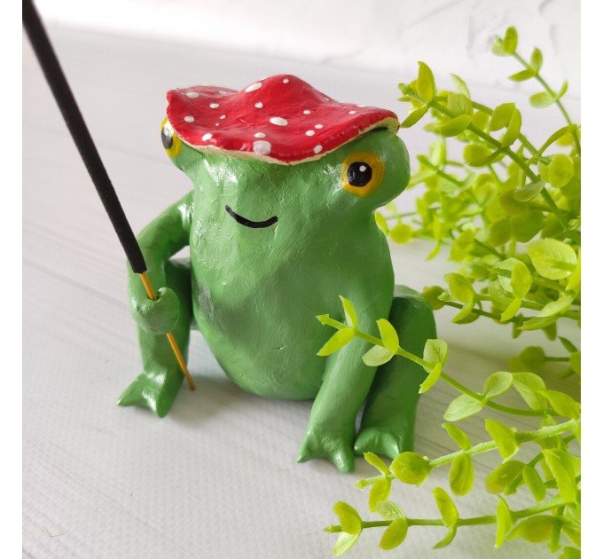 Sitting frog in red mushroom hat incense holder